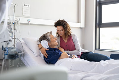 Picture of Daughter visiting mother in hospital